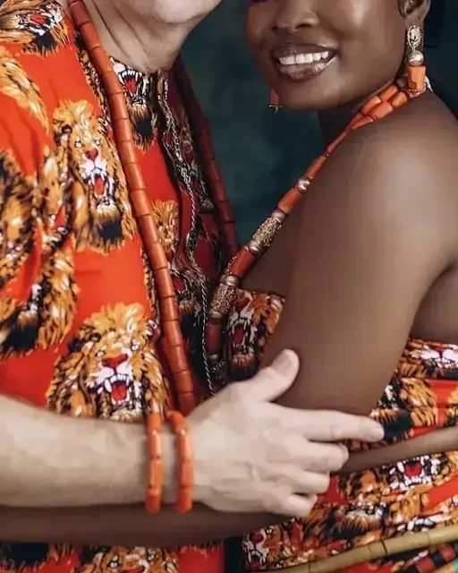 A couple in traditional attire with makeup by Uniktouch
